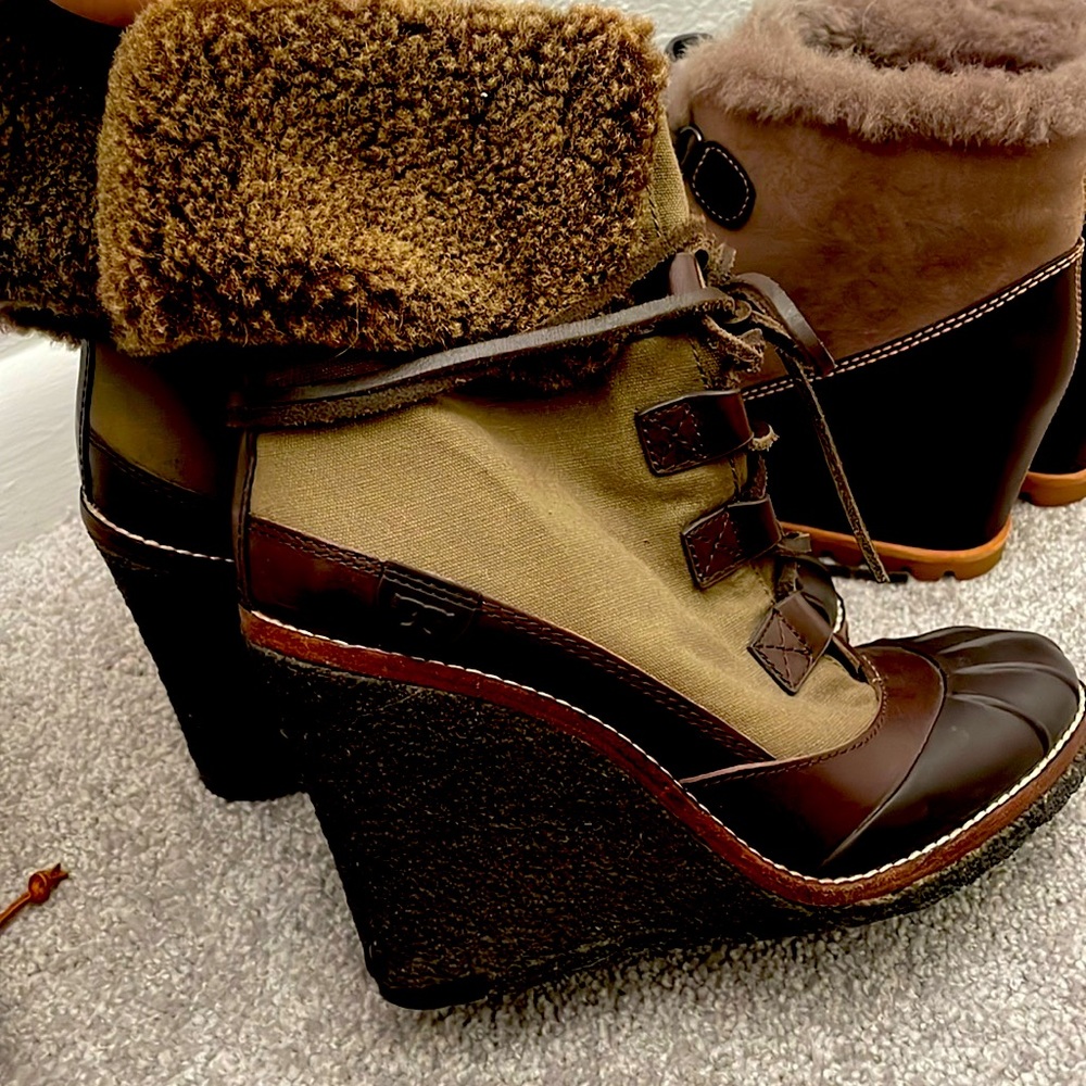 Brand New Tory Burch heeled boots.